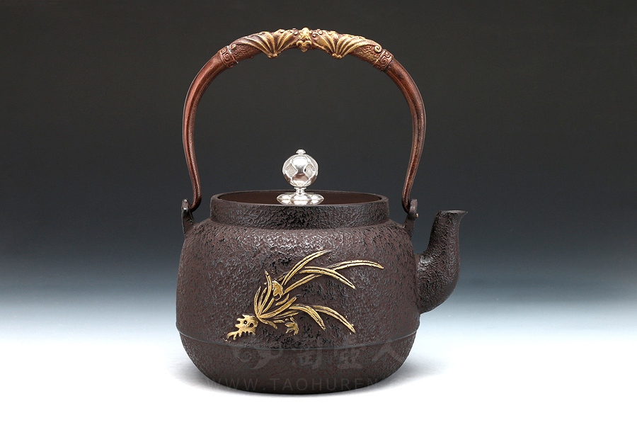 梅花镶金铁壶