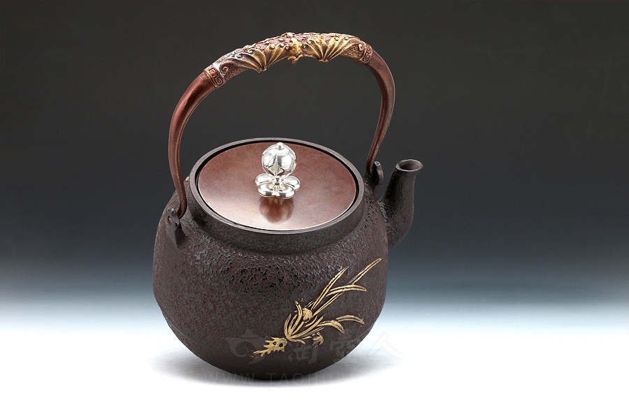 梅花镶金铁壶