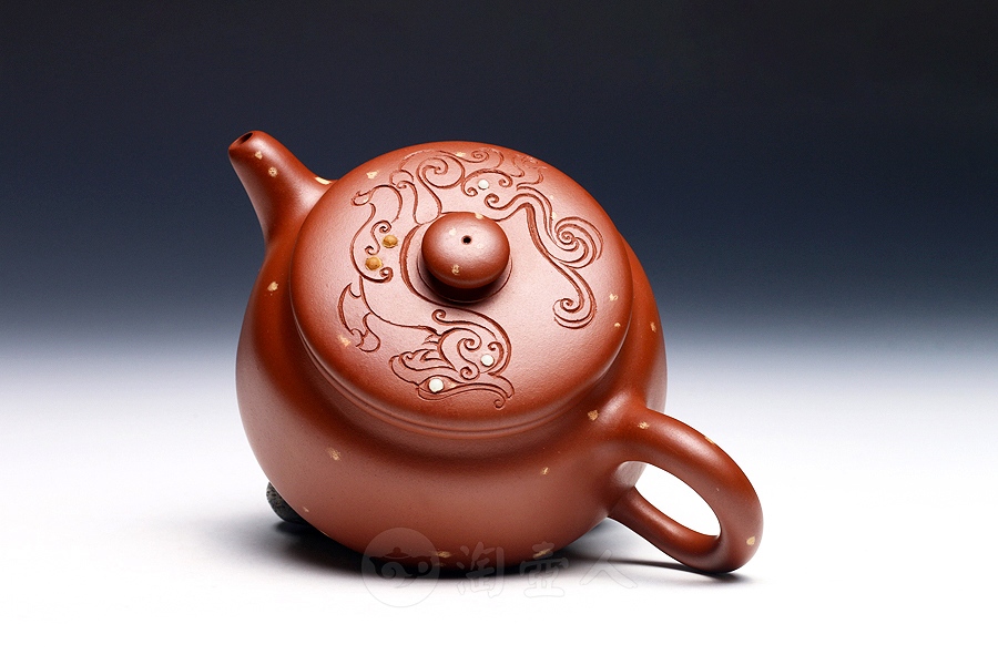段砂红璧
