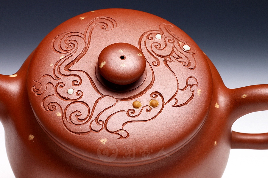 段砂红璧
