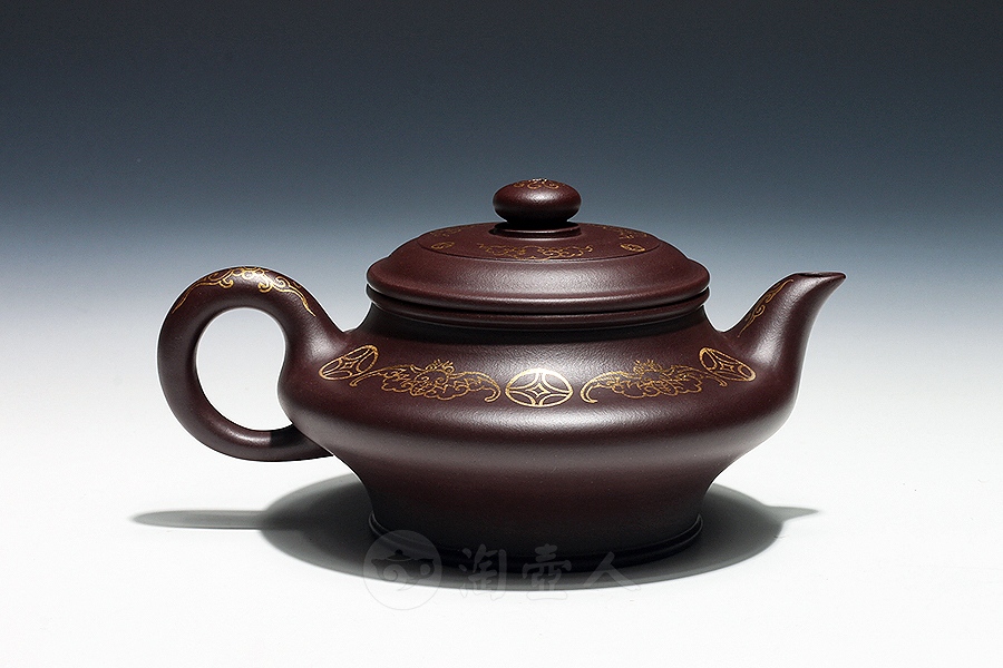 又名君宝,1953年出生于丁山陶瓷世家,1993年国工,师拜壶艺泰斗顾景舟