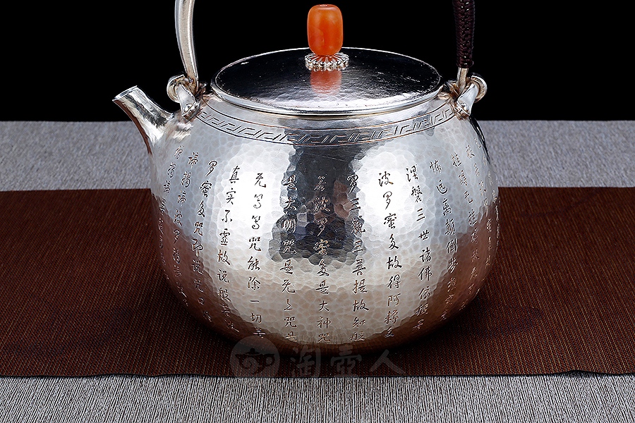 心经提梁