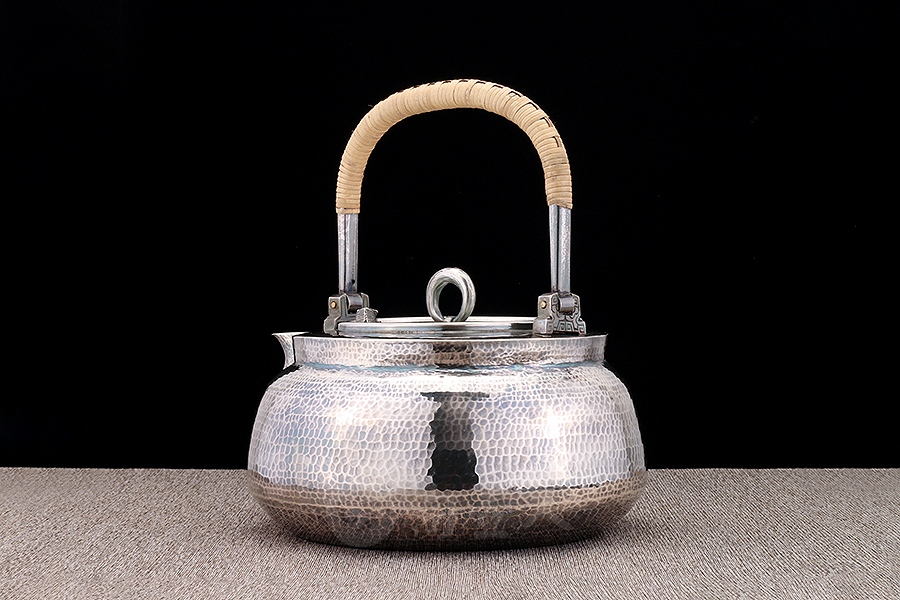 金声玉振提梁壶
