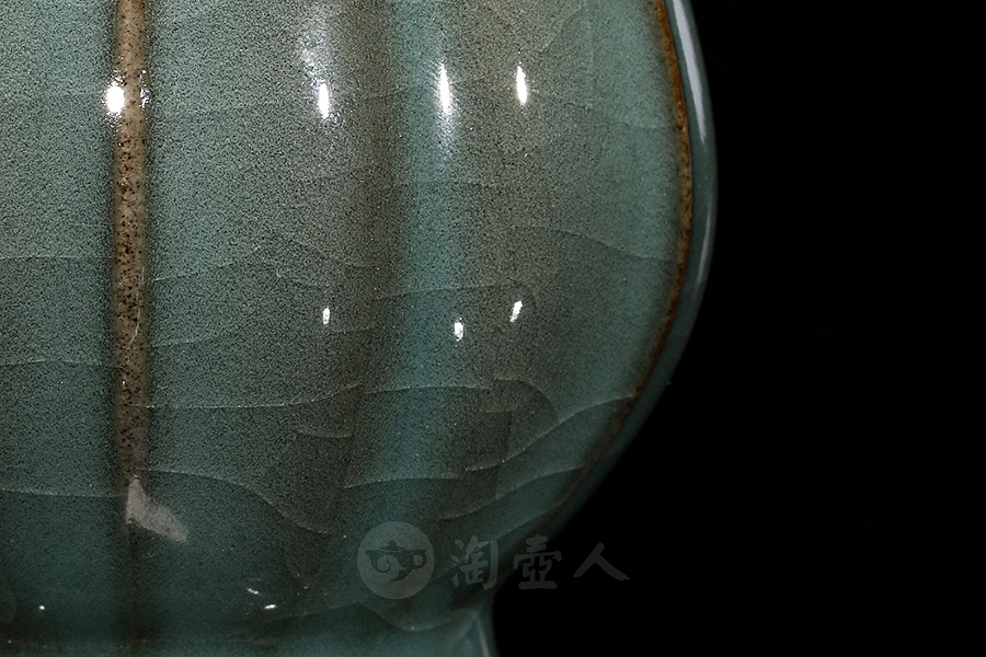 抽角菱花铁胎百财瓶