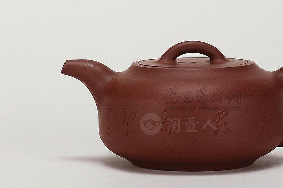 平盖圆腹壶