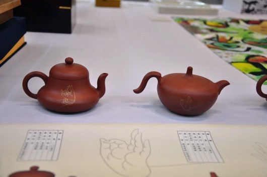 陶艺家李俊花开见佛紫砂作品亮相苏州创博会
