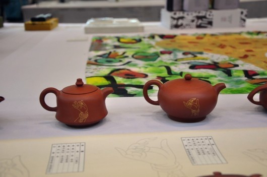 陶艺家李俊花开见佛紫砂作品亮相苏州创博会