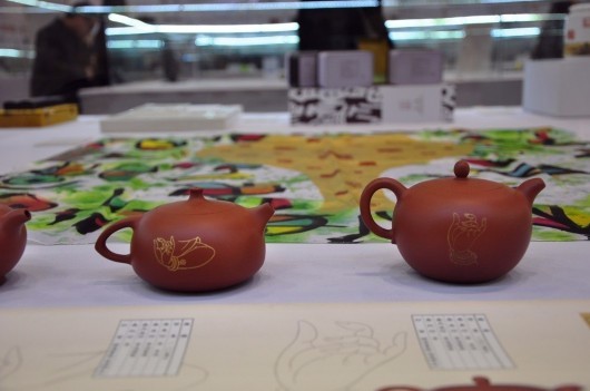 陶艺家李俊花开见佛紫砂作品惊艳亮相苏州创博会